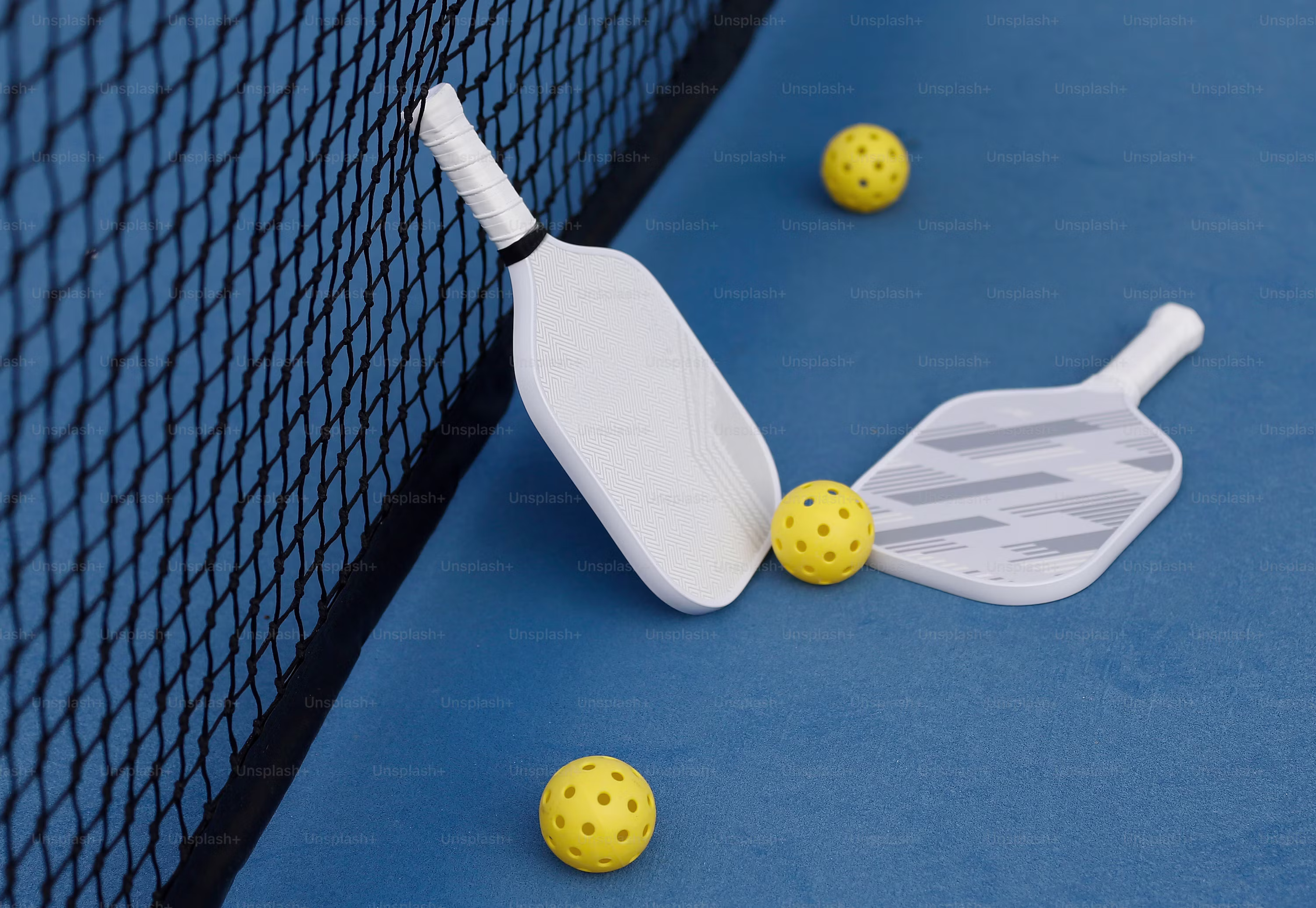 A collection of pickleball paddles